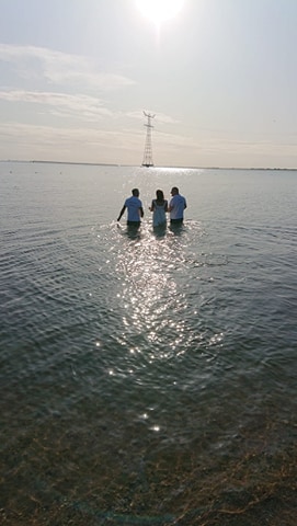 Doop in het Ketelmeer, tegen het licht in